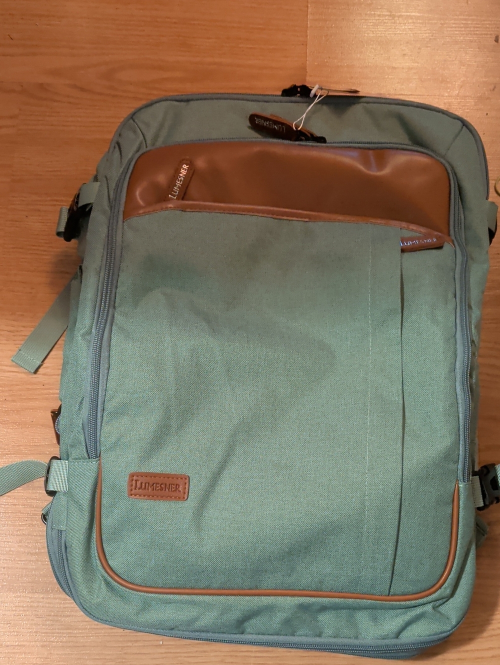 Green Travel Backpack with Brown Trim